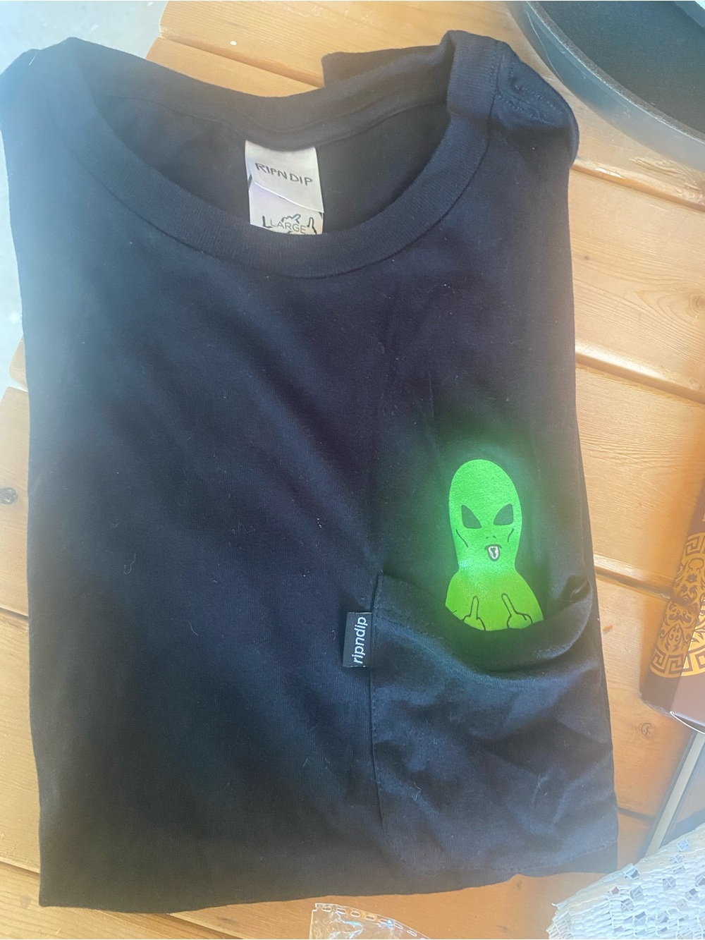 Ripndip Black Short Sleeve Tee with Green Alien Pocket Graphic